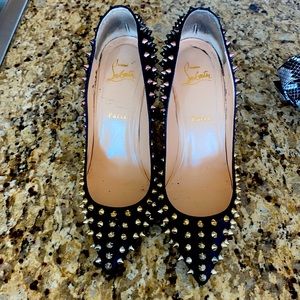 Louboutin heels paid for soles on bottom great condition